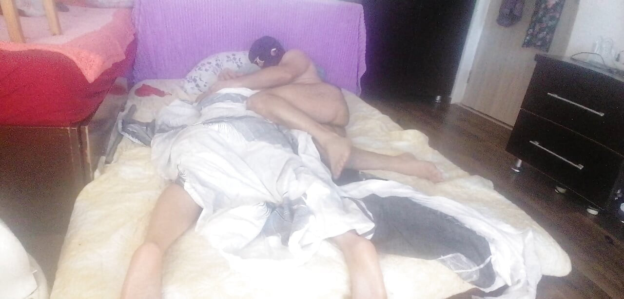 Sensual massage of a hot couple with oil on the body.