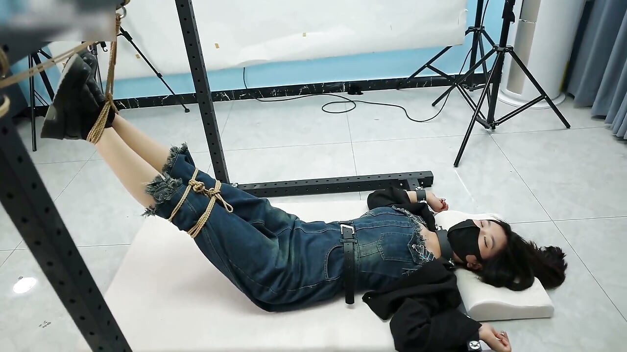 My Girlfriend Was Tied to an Iron Frame, Her Bare Feet Suspended and Tickled