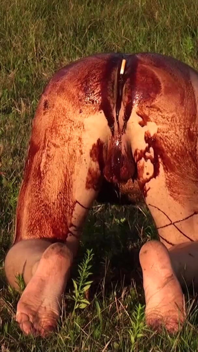 sex slave bathes in chocolate in the field! | Clip 1