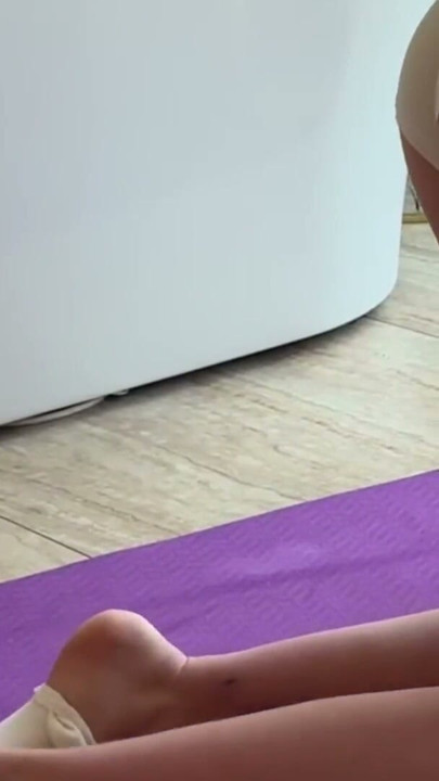 white tight shorts - yoga stretching | Clip 1