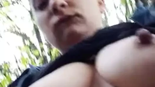 Fingering my pussy in nature and showing my tits in public