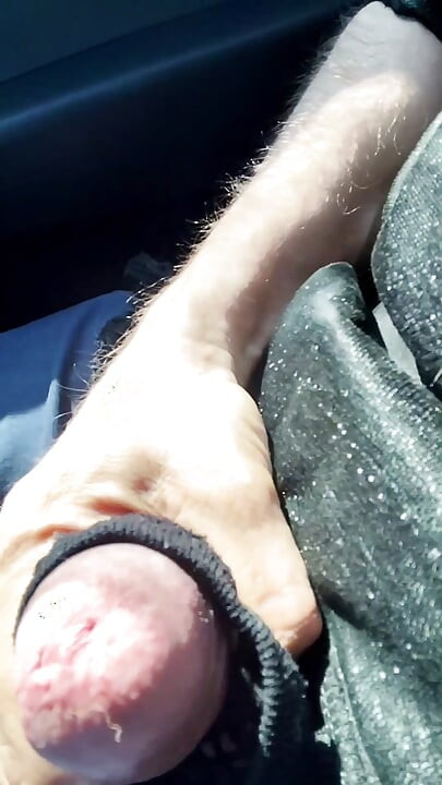 Almost caught! He jerks off in traffic in front of me, I love watching. Big cumshot! Part 1