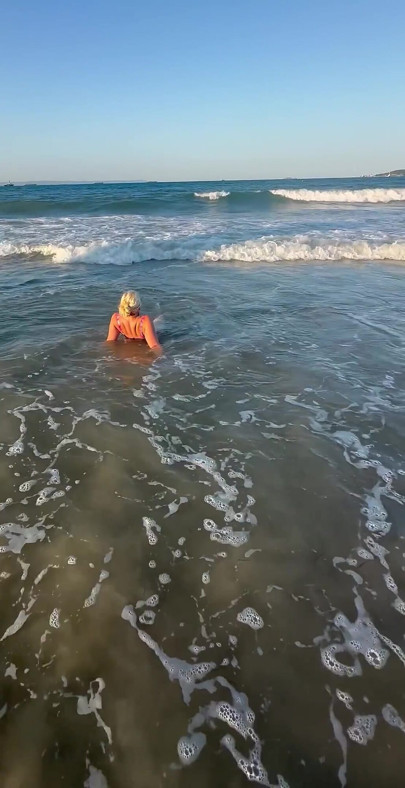 Try Not to Wet My Hair While Play with the Waves