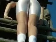 climbing  in  white spandex
