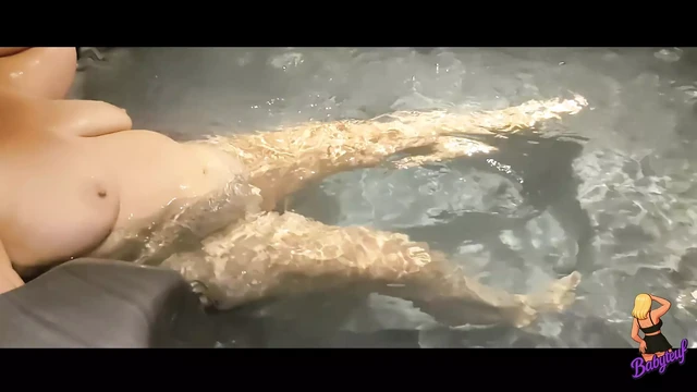 Stepmom pleasures herself by masturbating in the jacuzzi