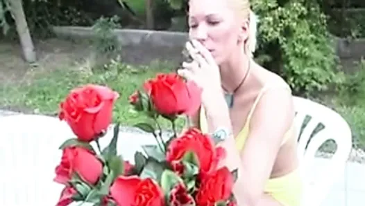 Shaved blonde smokes cigarette and fucks outdoors