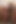 Sitting Afro-Latino man masturbating, lying on the floor in the bathroom