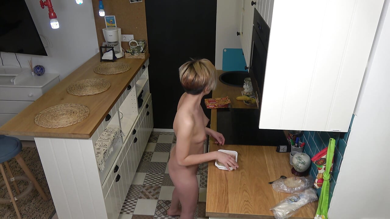 Completely Naked Teen Is Making Breakfast in the Kitchen