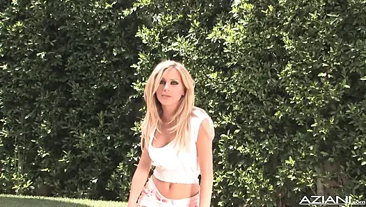Gorgeous blonde Julia poolside striptease