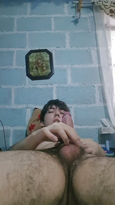 Horny young man masturbates alone and naked