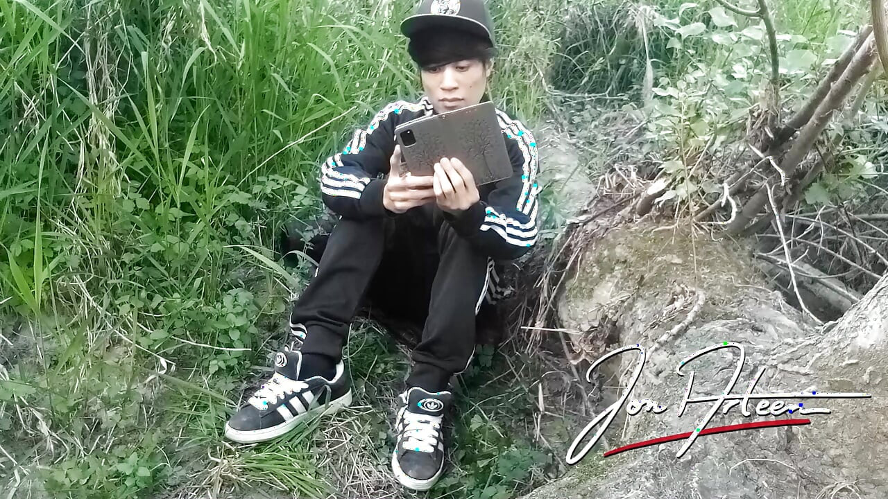 Gay boy Jon Arteen, wearing adidas tracksuit Campus sneakers, gets a hard-on outdoors, jerks off, squirts big cumshots before cl