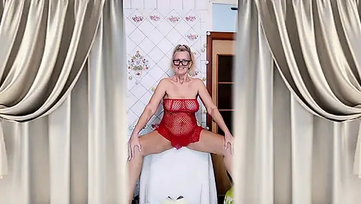 Hot housewife Lukerya flirts over morning coffee in a red mesh dress.