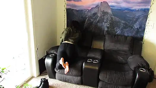 slow strip tease out of a sweater and jeans