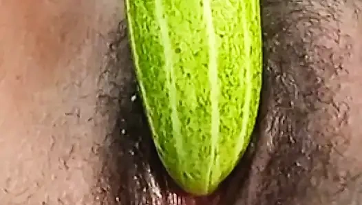 Teen college girl masterbating using cucumber