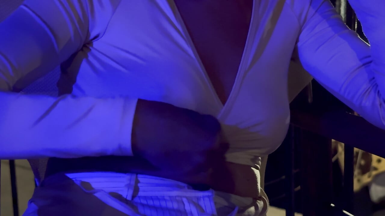 My beautiful breasts and pierced nipples are exposed in a night out bar by the sea