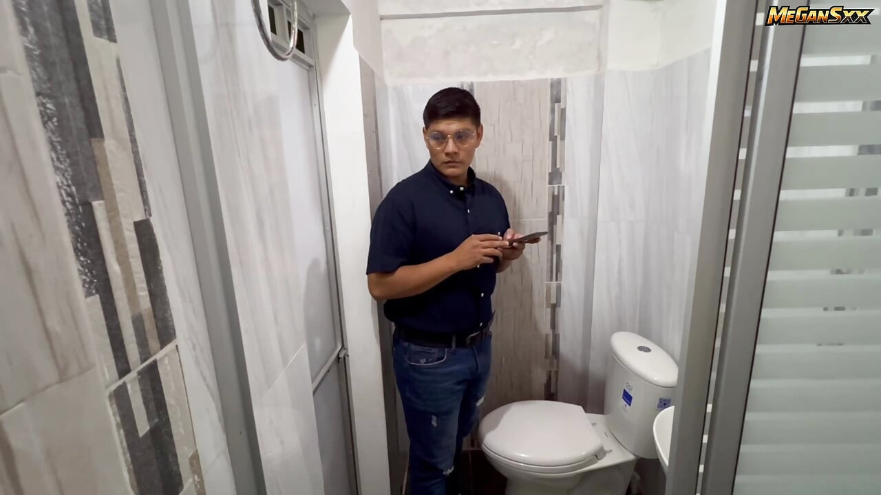 Teacher his student in the bathroom.