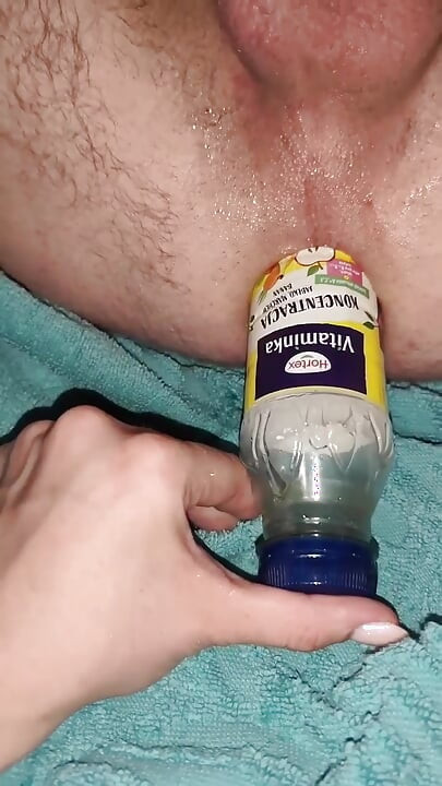 I fuck my husband with a bottle and a big black cock.
