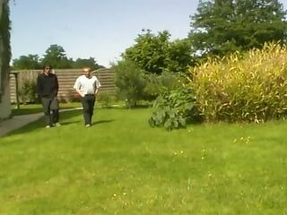 A slim blonde beauty from France gets two hard cock outdoors