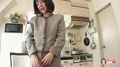 Makiko Nakane spreads her legs to show her pussy stuffed with cum after hard sex