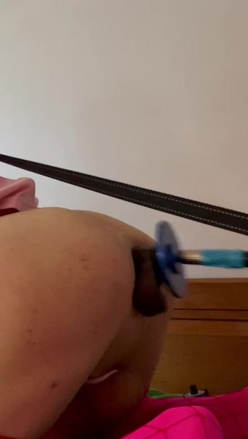 Sissy slut gets fucked by BBC toy on fuck machine while held in place with a collar and leash