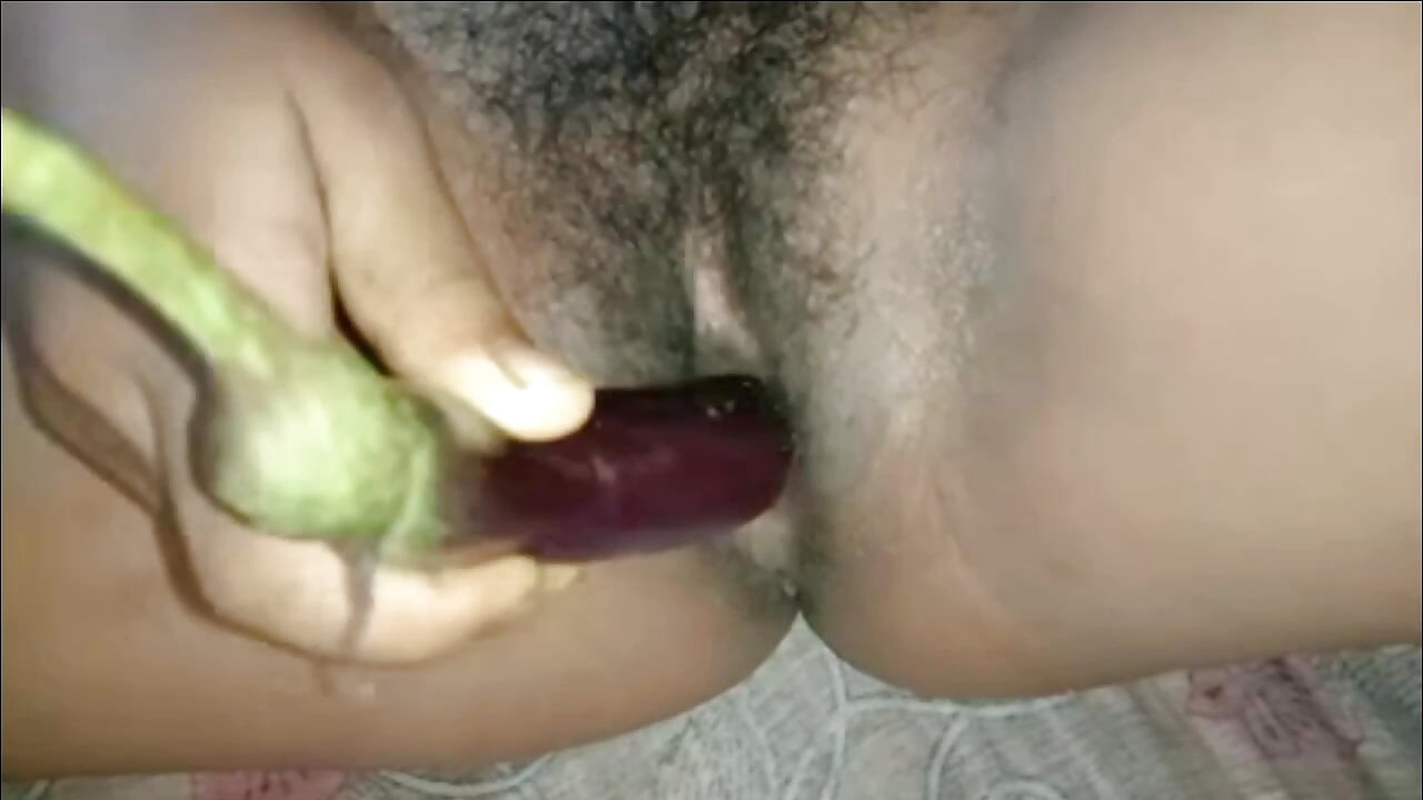 Girl fucking with brinjal
