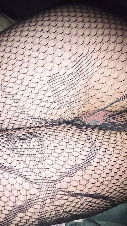 Cumshot on pussy in fishnets