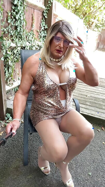 Sexy Crossdresser kellycd2022 in gold leopard print dress tan pantyhose and heels s