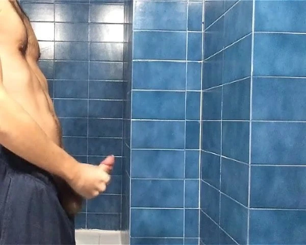 Big cum explosion against the bathroom wall. Lots of sperm