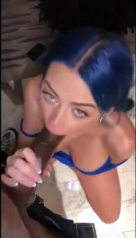 Gamer girl plays with big black joystick