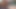 チンポを吸う唇が胸を露出させて私を倒す