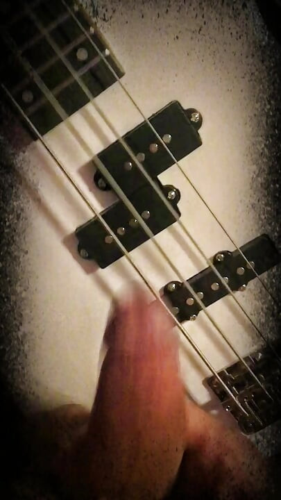 Big nice cock playing bass guitar