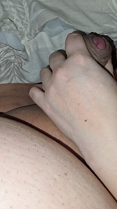 Step mom stick her hand on step son dick in erection and handjob his dick