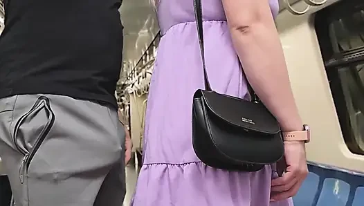 Almost Seen by Subway Passengers When She Touch Stranger's Dick Through Pants