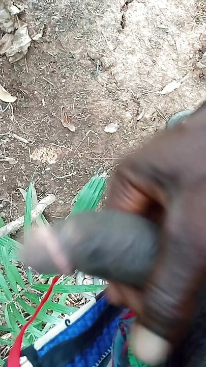 An Africans guy trying to wake his big dick