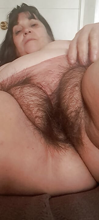 This hairy and horny mom's pussy