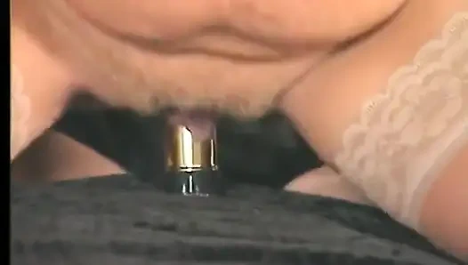 Blonde gilf wearing stockings while dildoing pussy