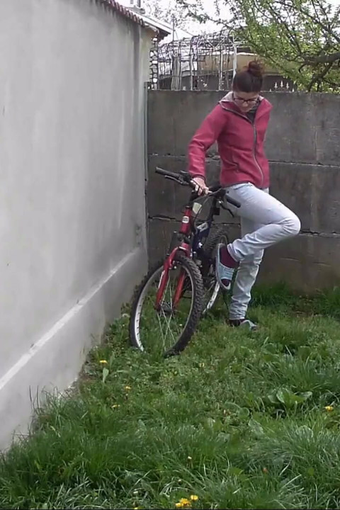 Pissing in the backyard on a cold day, and leaving on her bike
