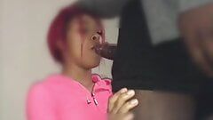 Redhead 18 year old ebony babe uses her throat on my cock.
