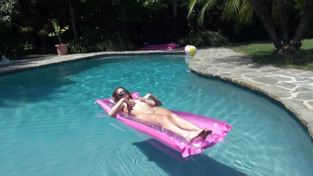 Teen whore fingers her pussy in the pool then rides a cock hard