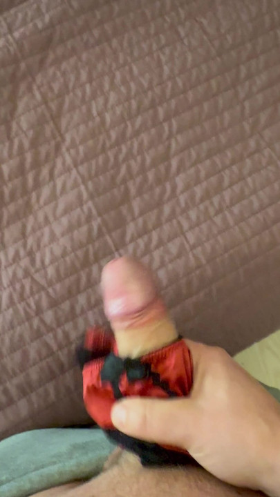 Teasing cock with red shiny panties