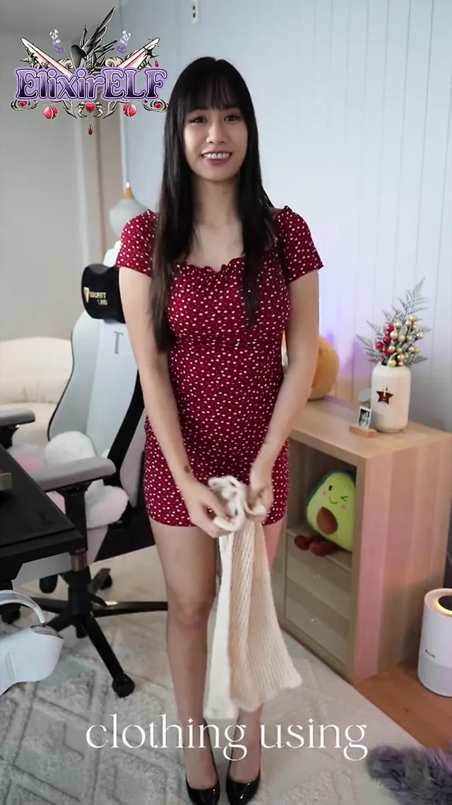 removing my red dress behind small towel . elixir elf shorts