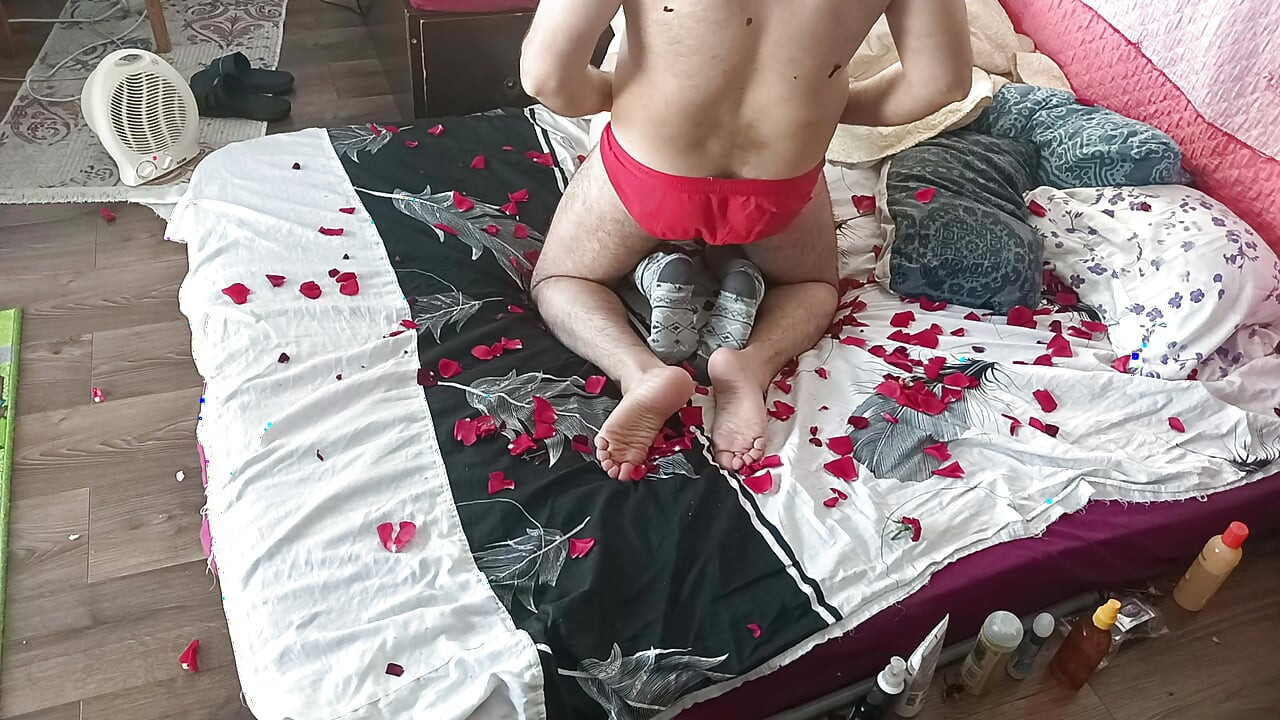 Sensual massage of a hot couple with oil on the body. Foreplay in the bedroom with an amateur couple