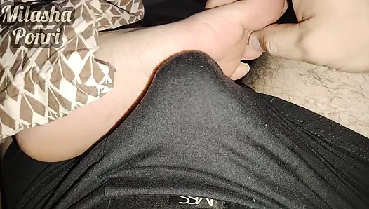 Stepsister's feet get a light massage while watching a movie