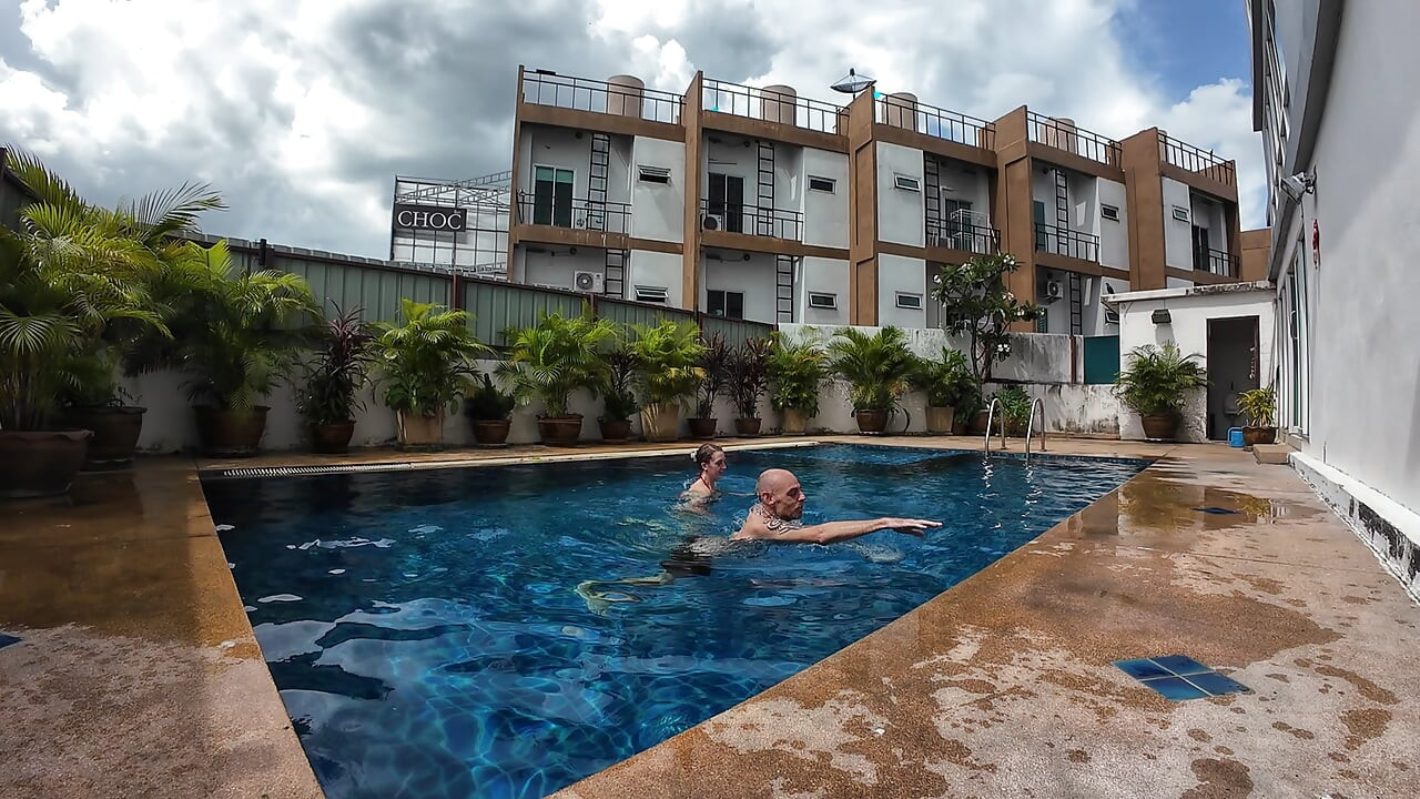 watch us playing in our swimming pool