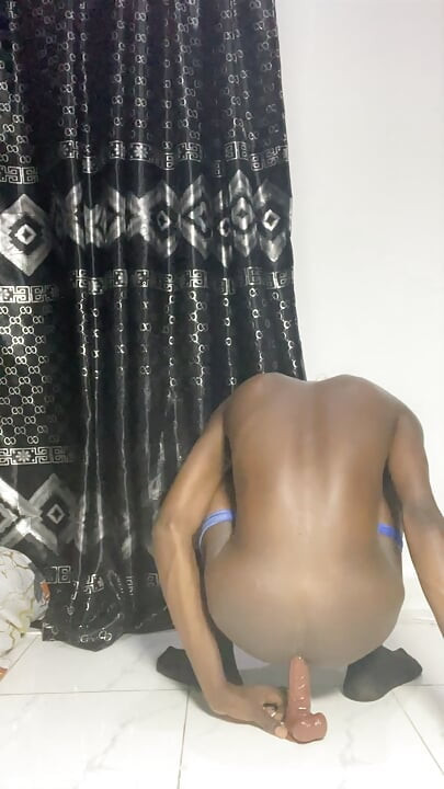 Young twink ride his toy when home alone