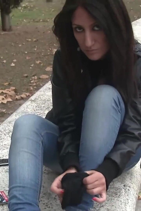 Sexy brunette ambra plays with her sexy feet outdoors