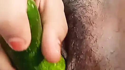 Teen college girl masterbating using cucumber