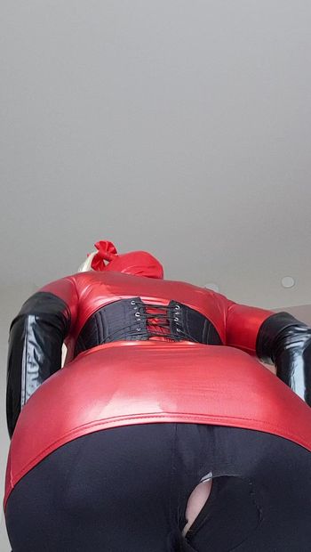 Sissy bimbo fucktoy in red waiting to service cocks