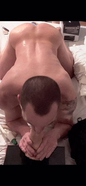 Sucking a dildo