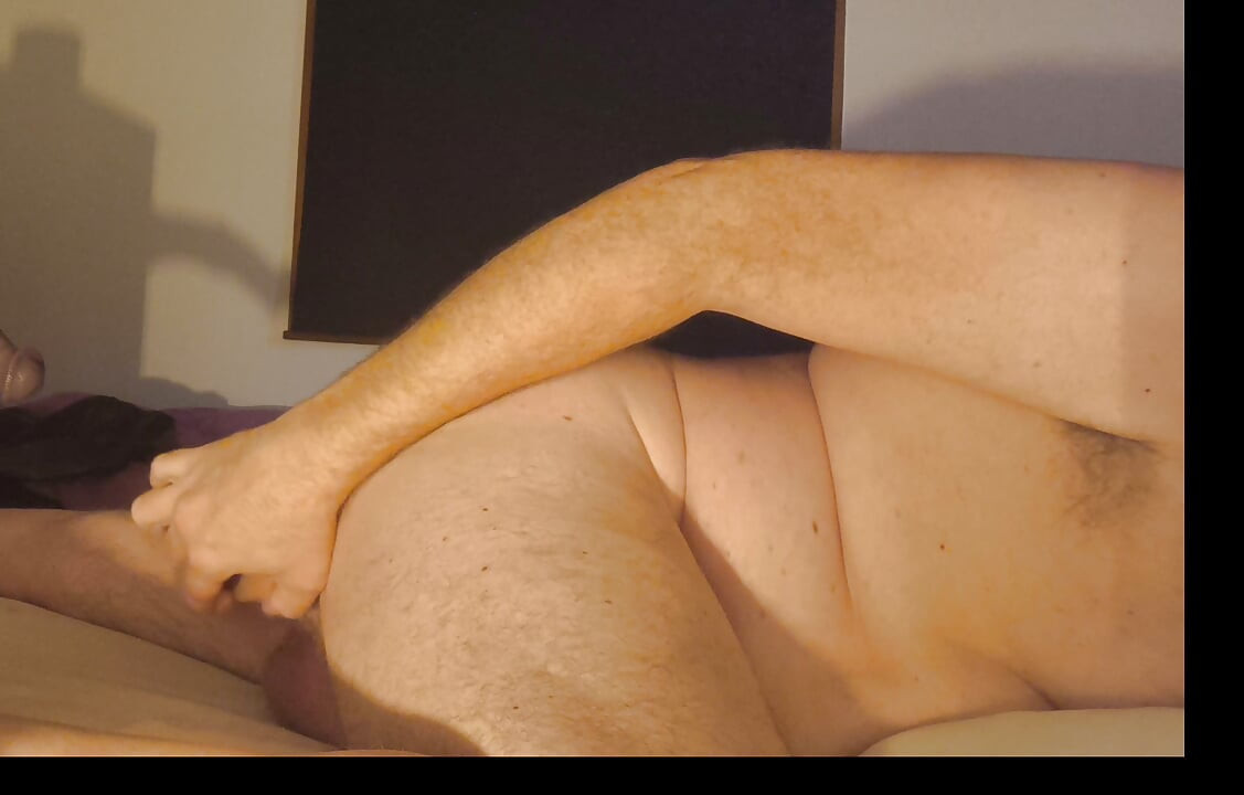 Papii on his stomach and his between his buttocks